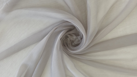 Muselină gri oțel din mătase naturală aranjată în spirală cu centrul mai închis