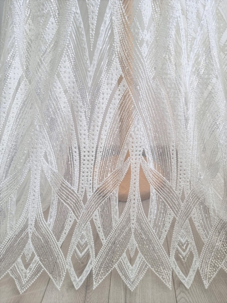 Broderie ivoire realizata manual Maya