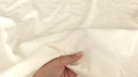 jacquard bumbac ivory la metru, prins în mână, cu pliu adunat