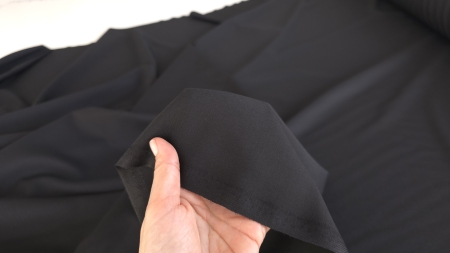 stofa din lana neagra pentru costume detaliu textura