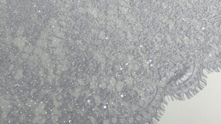 Material gri cu reflexii ușoare de la paiete