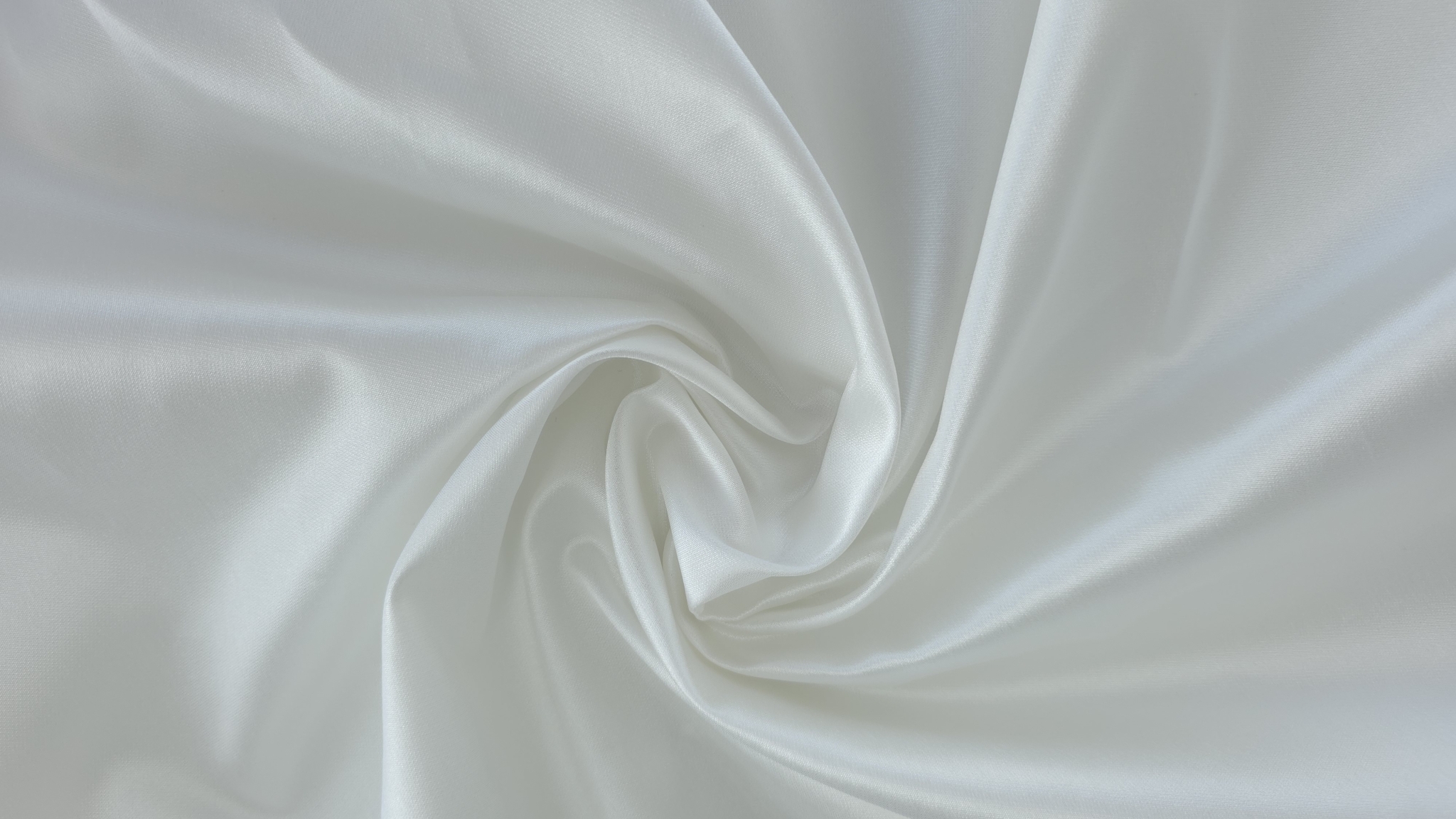 Mikado ivory la metru material aranjat în spirală pe fundal neutru