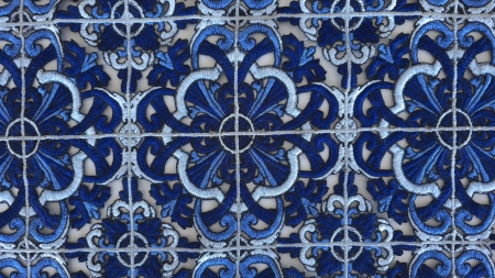 prim plan cu intersectie de motive brodate albastre si decupaje