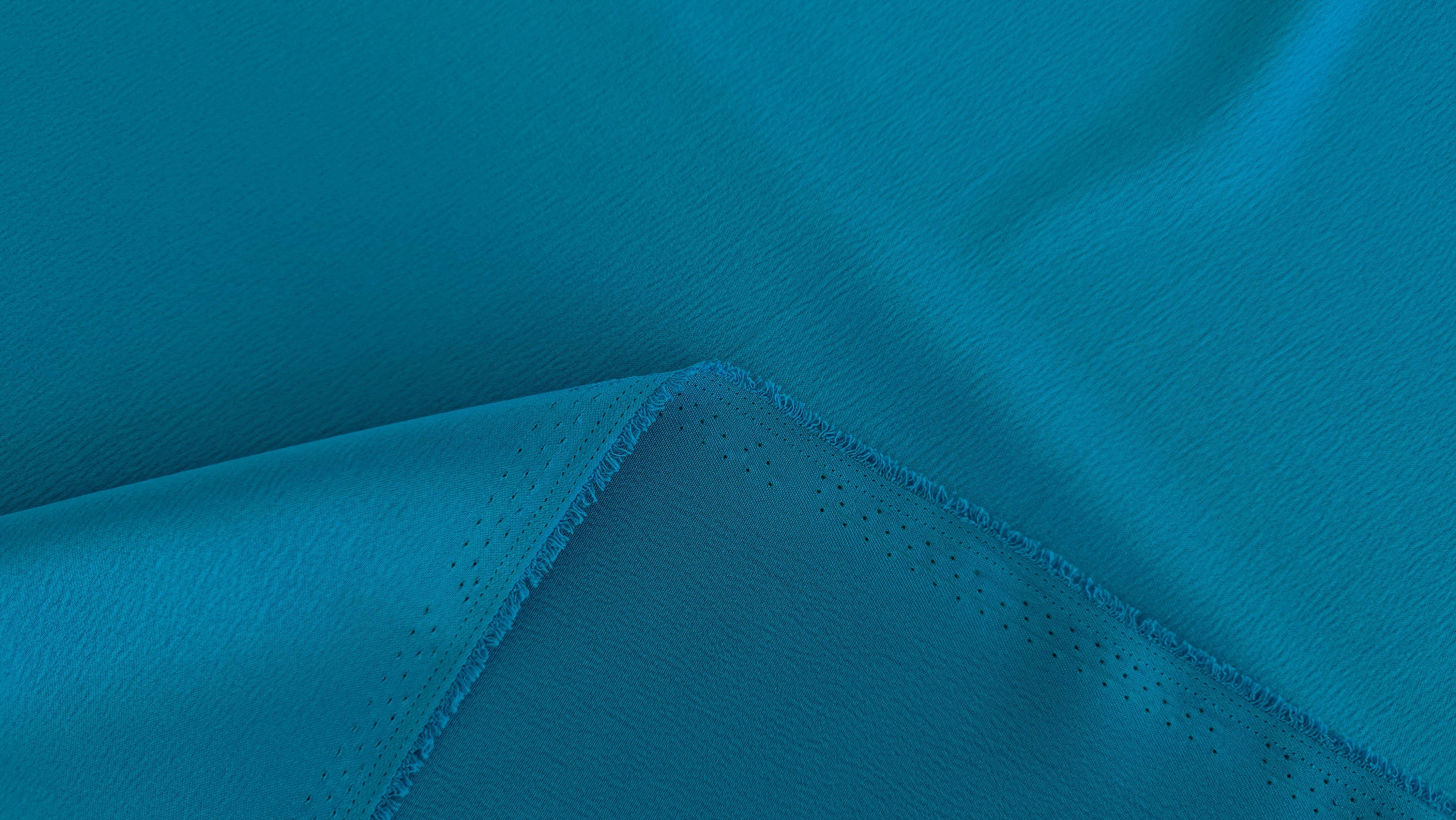 Detaliu față și dos al taftei basic turquoise, margine îndoită cu structură diagonală fină