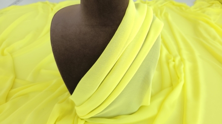 Plan oblic cu multiple falduri paralele îngustate spre marginea superioară a materialului