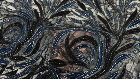 Zona de tranziție între motivele dense și cele rare, catifea turcoaz pe fond negru