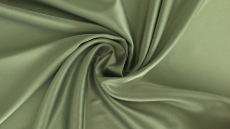 Răsucire spiralată pe țesătură verde cu reflex catifelat