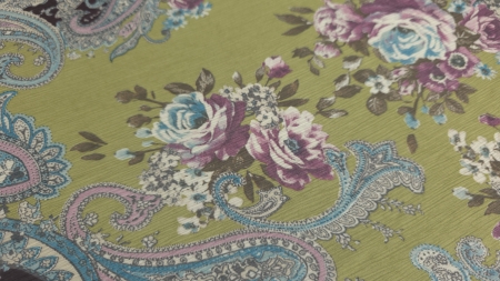 Detaliu de model paisley cu buchete florale pe fond verde lime