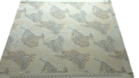 Material desfășurat pe lățime cu imprimeu leopard și riglă de măsură