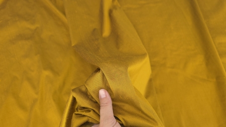 material tinut in mana