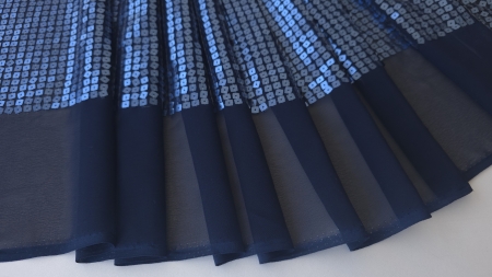 Paiete geometrice pe voal bleumarin, material desfășurat în pliuri largi